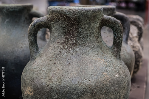 Fotografie Faded antique vases closeup view for background