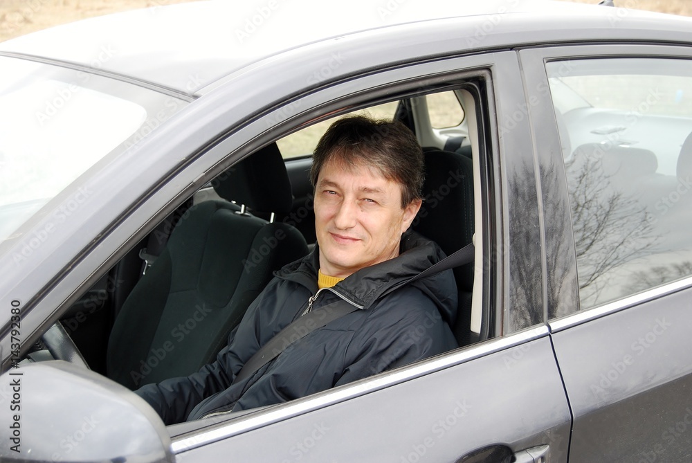 Man driving a car Man driving a car