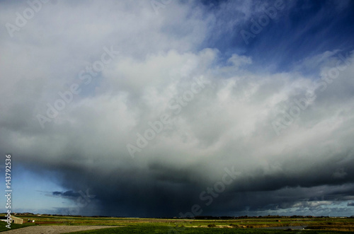 Wild weather with big stormy clouds at the Wattensea © bettysphotos