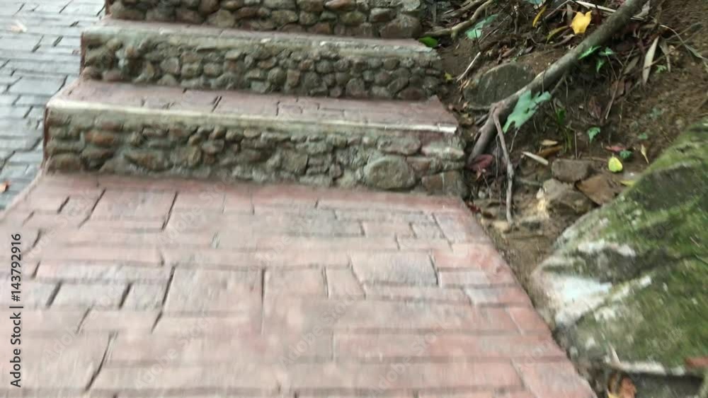 Walk up by stairs to Thailand small temple in jungle Walk up by stairs to Thailand small temple in jungle