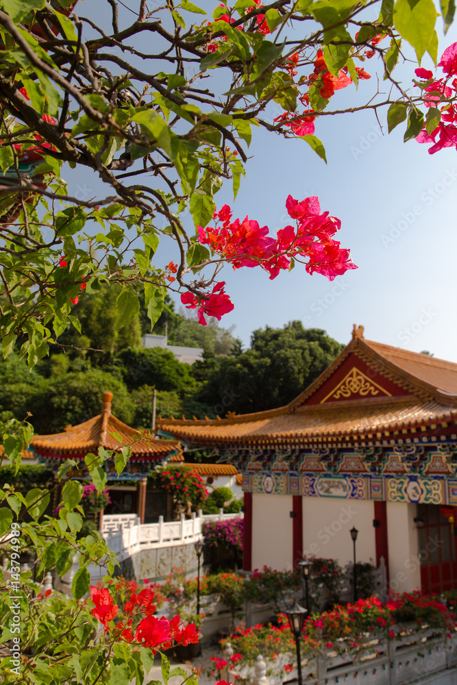 Temple with foliage and flowers 