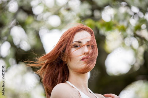 Gorgeous woman with hair in wind. Outdoor shooting. Lifestyle and relaxation © DC Studio