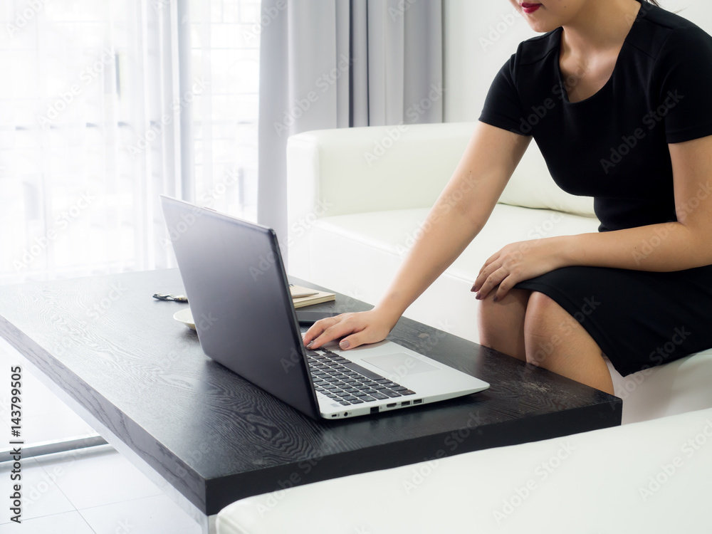 Fototapeta premium Businessman pointed a finger at notebook,boss pointing on mistakes at office,notebook on table.He is using a laptop .He explain project marketing.