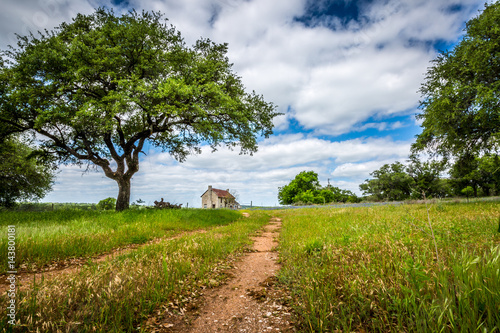 Bluebonnet House (mid-19th century) Marble Falls Built in the mid-19th century, this abandoned two-story limestone house sits in fields of bluebonnets