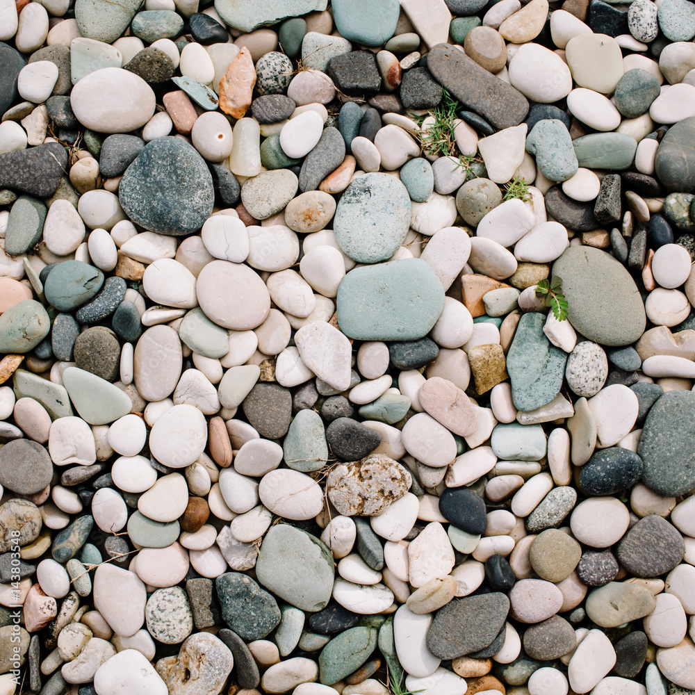 Neutral pattern of pale stones. Flat lay, top view Neutral pattern of pale stones. Flat lay, top view