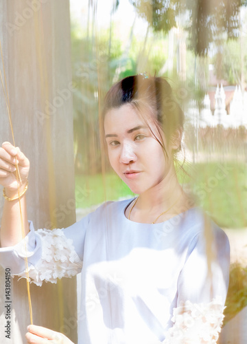 portrait of confident flirting woman with sexy look in camera