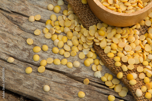 Soybean on wooden table, top view