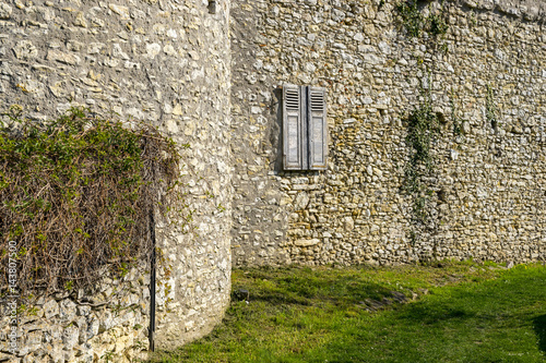 A village with a completely preserved wall from the Middle Ages which still leads around the entire village. photo