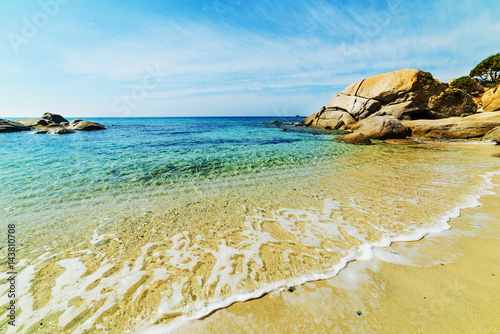 Rocks and sand in Cala Caterina