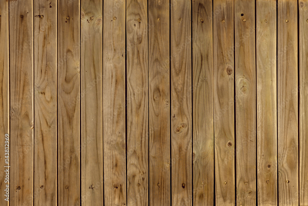 Old brown wooden wall, detailed background photo texture. Wood plank fence close up.
