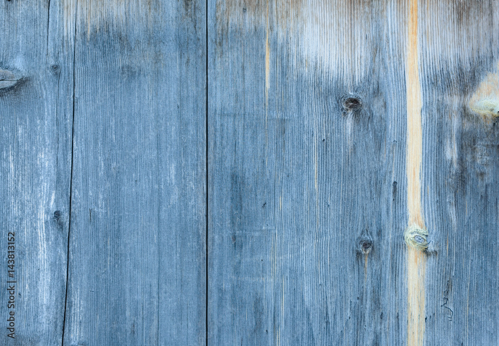 Old blue wooden wall, detailed background photo texture. Wood plank fence close up. Retro color style.