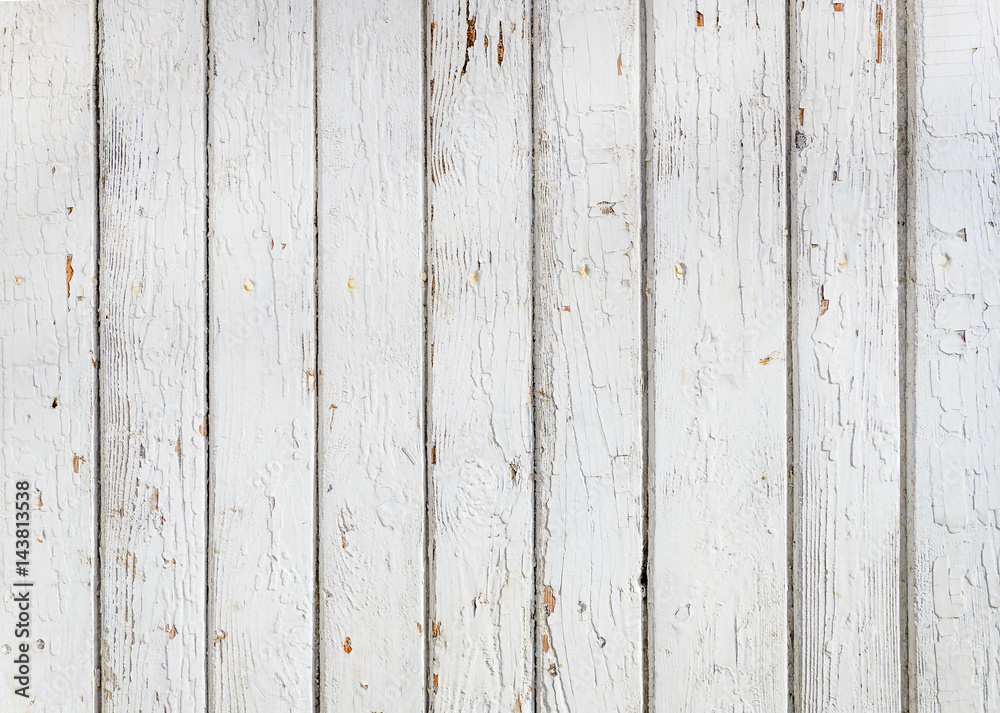 Wood plank fence with an old paint white color close up. Detailed background photo texture. Wooden wall abstract background.
