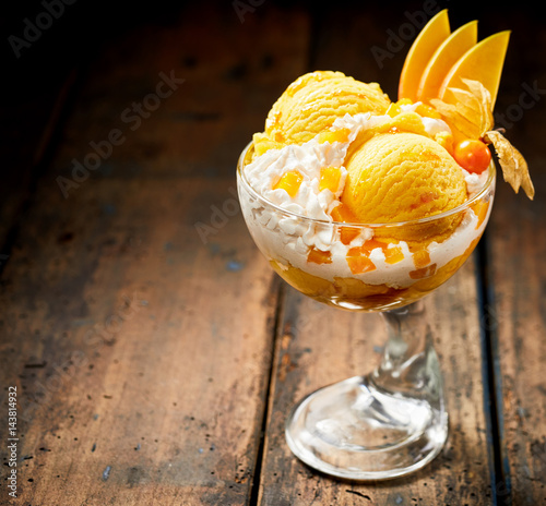 Serving of Italian speciality mango ice-cream photo