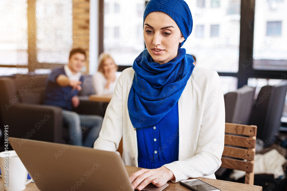 Pleasant muslim businesswoman feeling injustice from the society