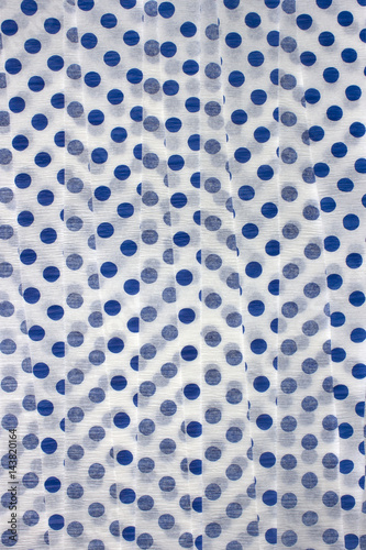 This is a photograph of Royal Blue Polka dot Crepe paper streamers
