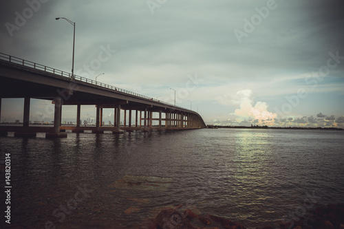 Rickenbacker Causeway Bridge that connects Miami to Key Biscayne and Virginia Key. Blue sky, skyline, ocean. Miami. Florida. USA