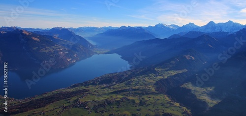 View from mount Niesen towards lake Thunersee. Villages Aeschi and Aeschiried.