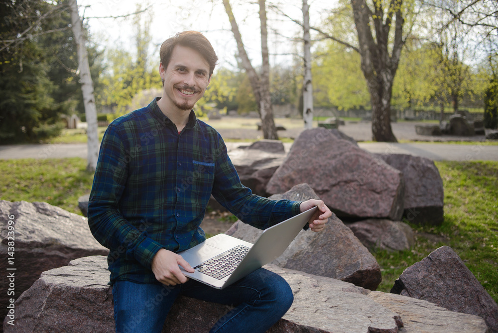 Obraz premium Man with laptop