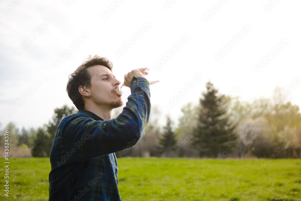 Young guy drink water