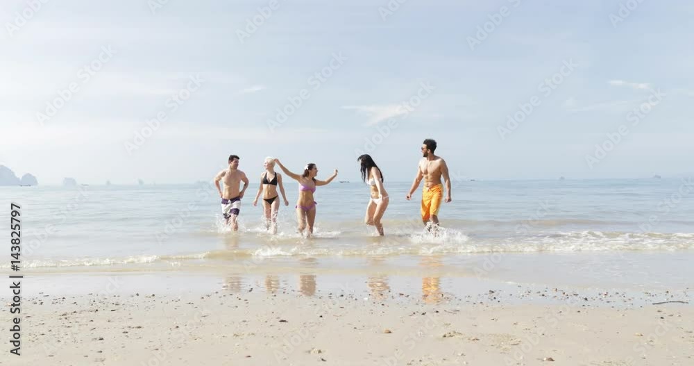 People Running From Water On Beach Talking, Young Man And Woman Group On Seaside Slow Motion 60 People Running From Water On Beach Talking, Young Man And Woman Group On Seaside Slow Motion 60