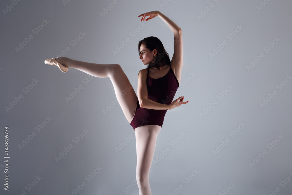 Fototapeta premium Ballerina dancing in the darkness