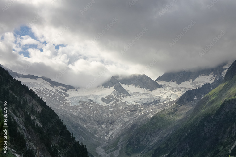 Glacier on Hochfeiler mountain during sunrise at lake Schlegeisstausee reservoir in Zillertal Alps near village Mayrhofen in Austria Tirol Tyrol landscape nature