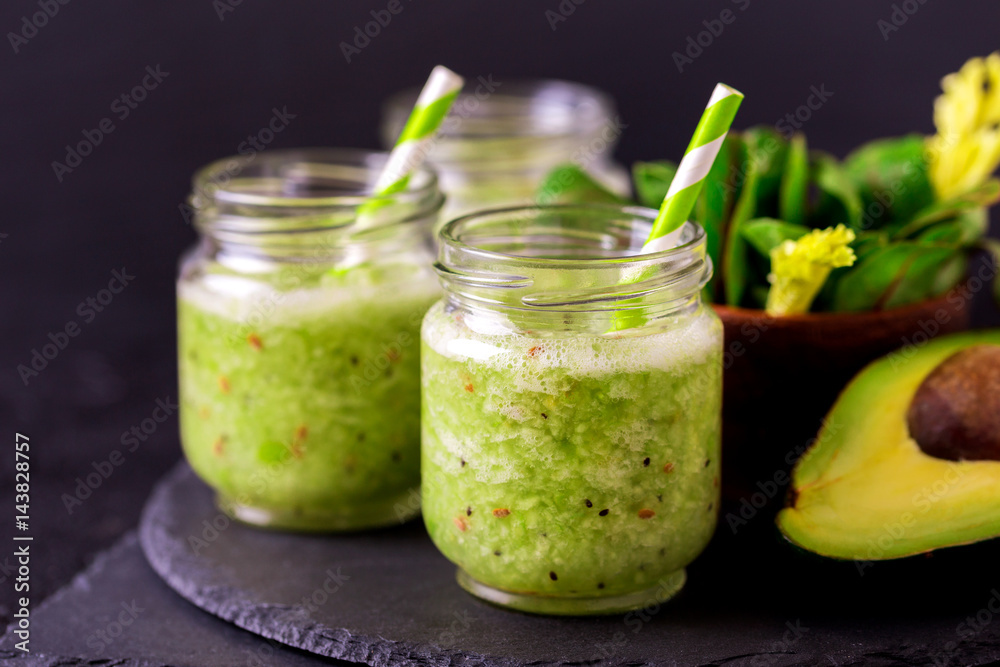 Green smoothie with avocado, spinach and celery. Healthy food Green smoothie with avocado, spinach and celery. Healthy food