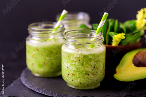 Green smoothie with avocado, spinach and celery. Healthy food