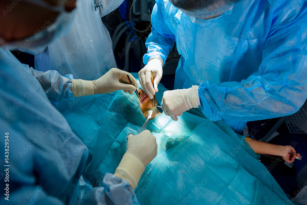 Doctors using different medical instruments Doctors using different medical instruments