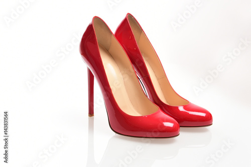 Red elegant shoes on a white background