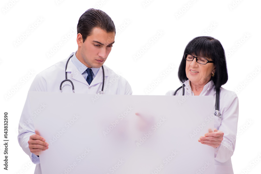 Two doctors isolated on the white background Two doctors isolated on the white background