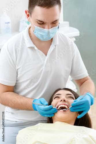 Young woman visiting her dentist