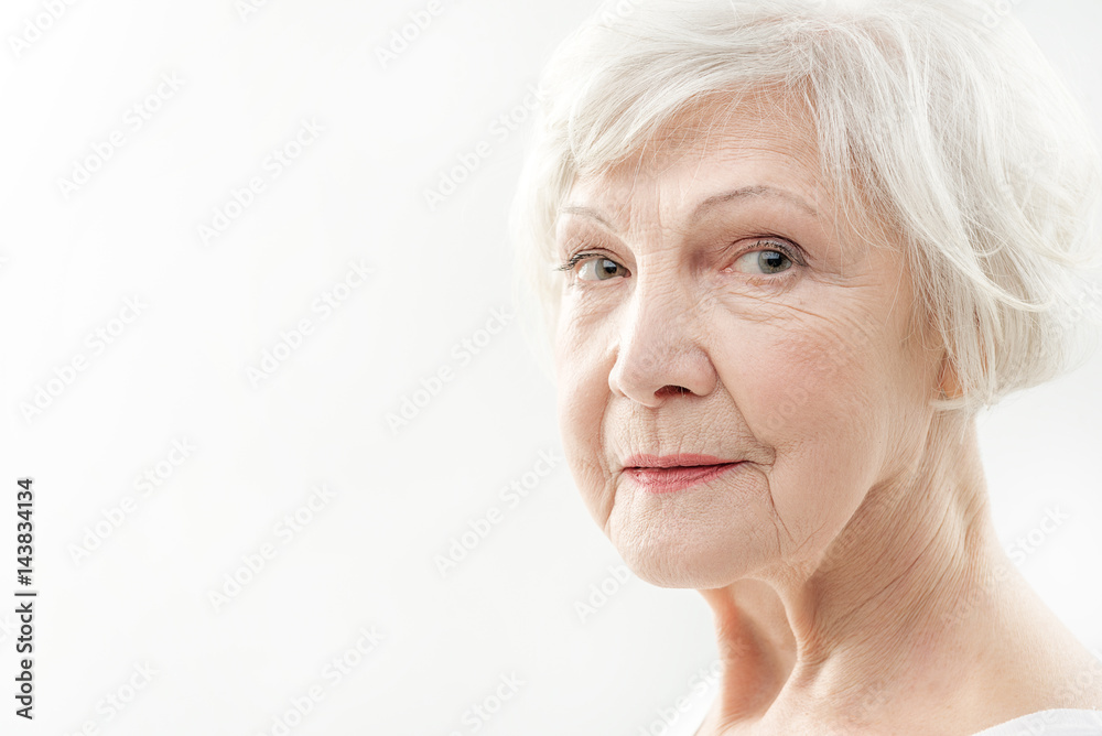 Serine senior lady with wrinkles on face Serine senior lady with wrinkles on face