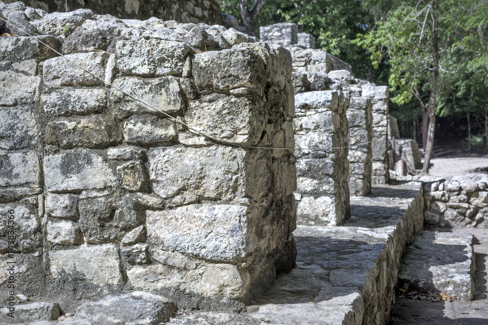 ancient stone architecture relics at Coba Mayan Ruins, Mexico