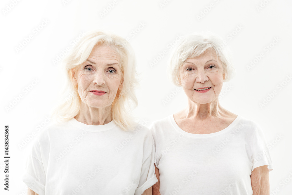 Cheerful two senior ladies expressing positivity Cheerful two senior ladies expressing positivity