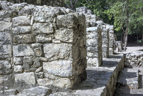 ancient stone architecture relics at Coba Mayan Ruins, Mexico photo