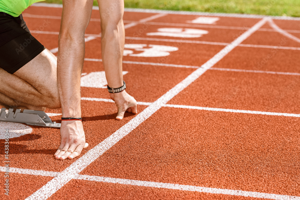 Professional runner at the starting line