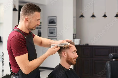 Barber making modern male h...