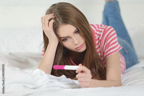 Young beautiful woman lying...