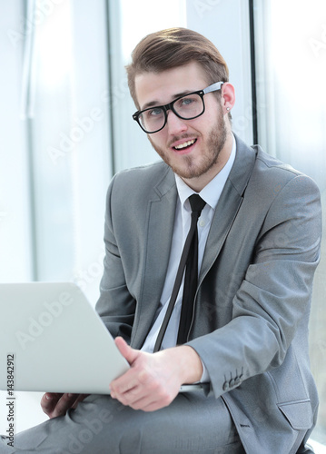 Handsome smiling confident business man portrait