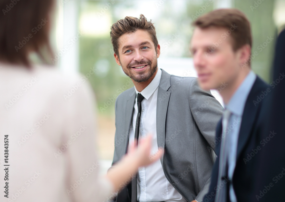 Business and office concept - smiling business team working in Business and office concept - smiling business team working in