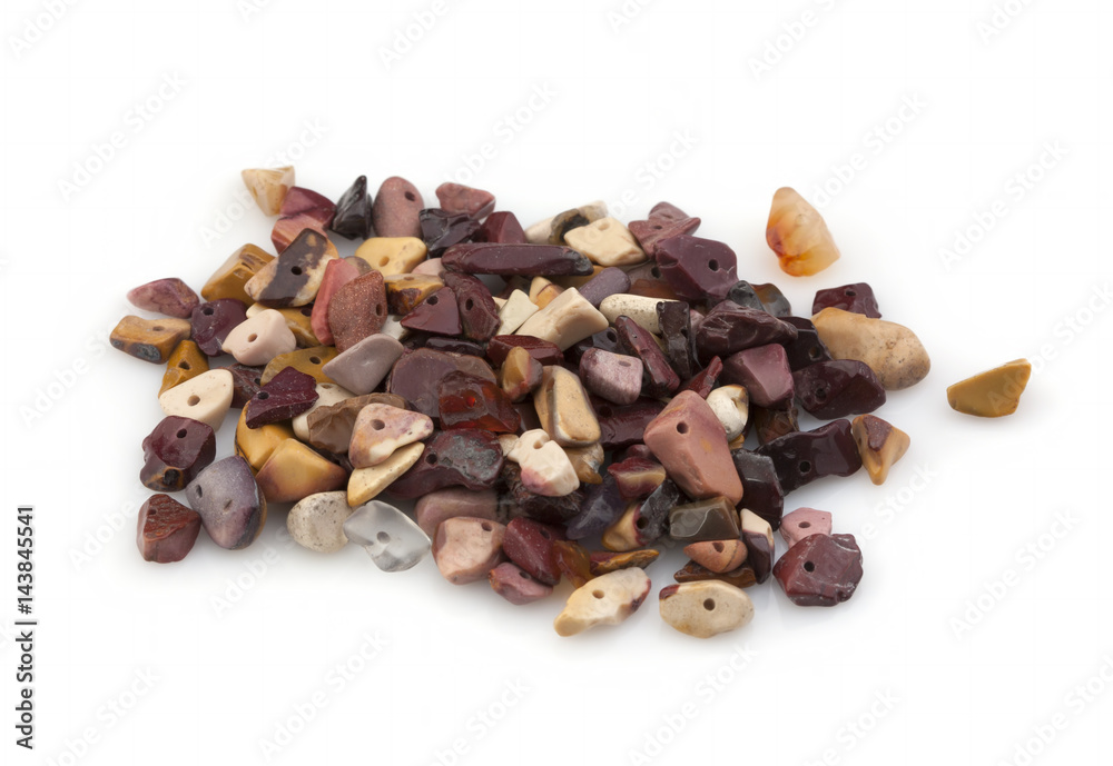Natural stones crumb for ornaments on a white background Natural stones crumb for ornaments on a white background