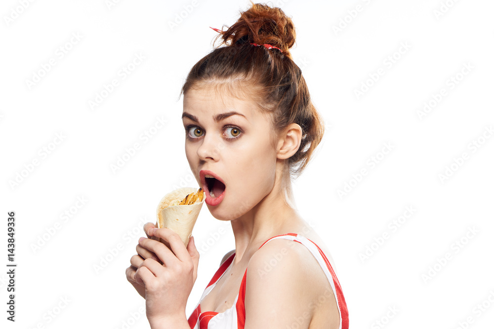 woman with wide eyes holding fast food in hands woman with wide eyes holding fast food in hands