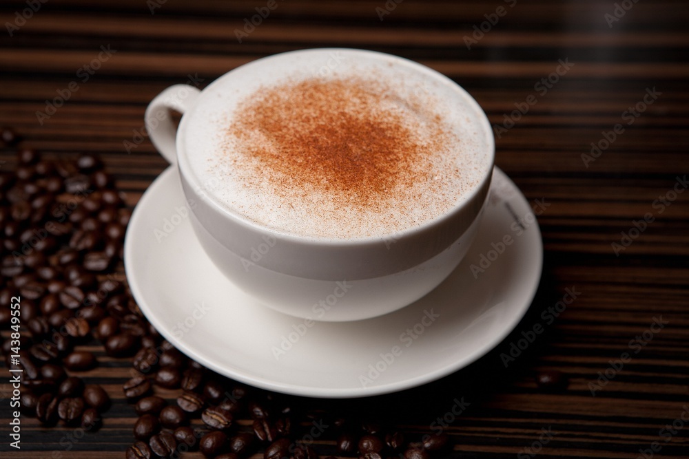 A cup of cappuccino on coffee beans, 카푸치노 A cup of cappuccino on coffee beans, 카푸치노