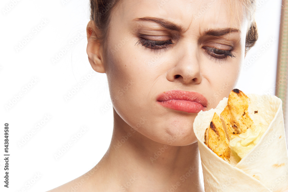 a woman looks indignant at fast food a woman looks indignant at fast food