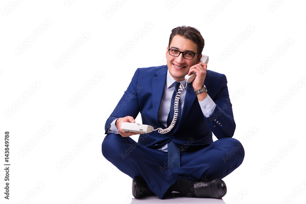 Businessman sitting on the floor isolated on white Businessman sitting on the floor isolated on white
