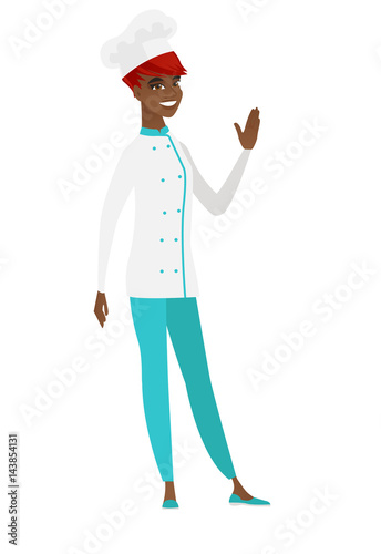 Young african-american chef cook waving her hand.