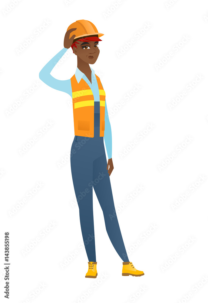 Young african-american builder scratching head. Young african-american builder scratching head.