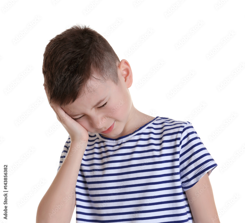 Cute boy suffering from headache on white background Cute boy suffering from headache on white background