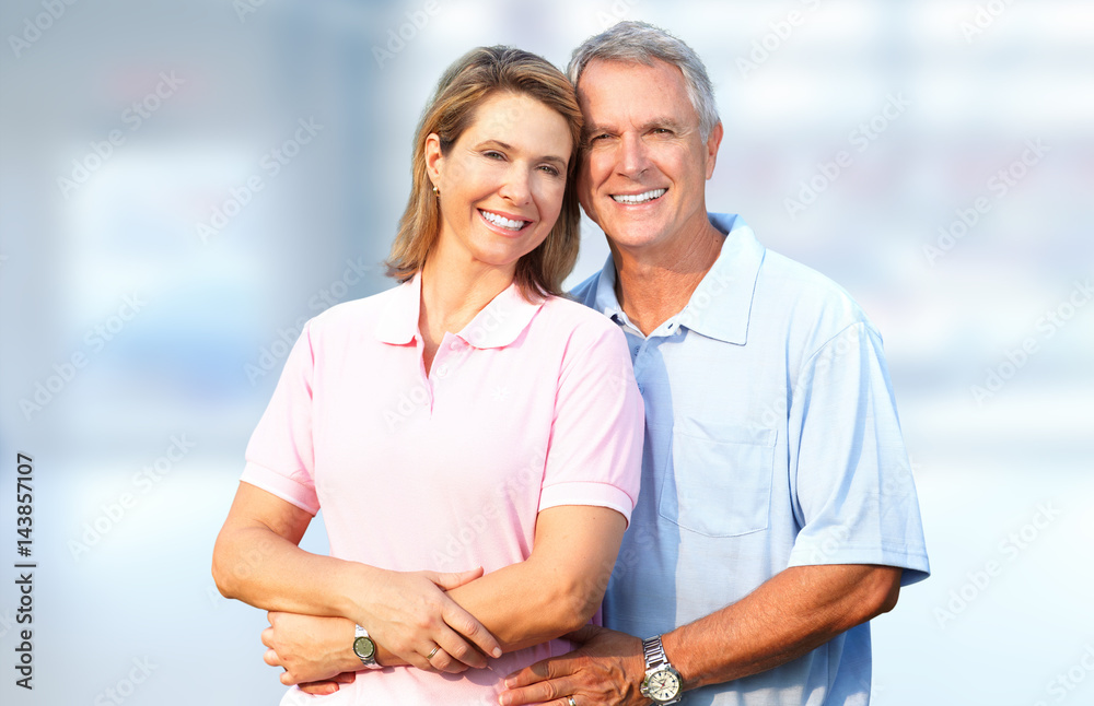 Senior couple smiling.